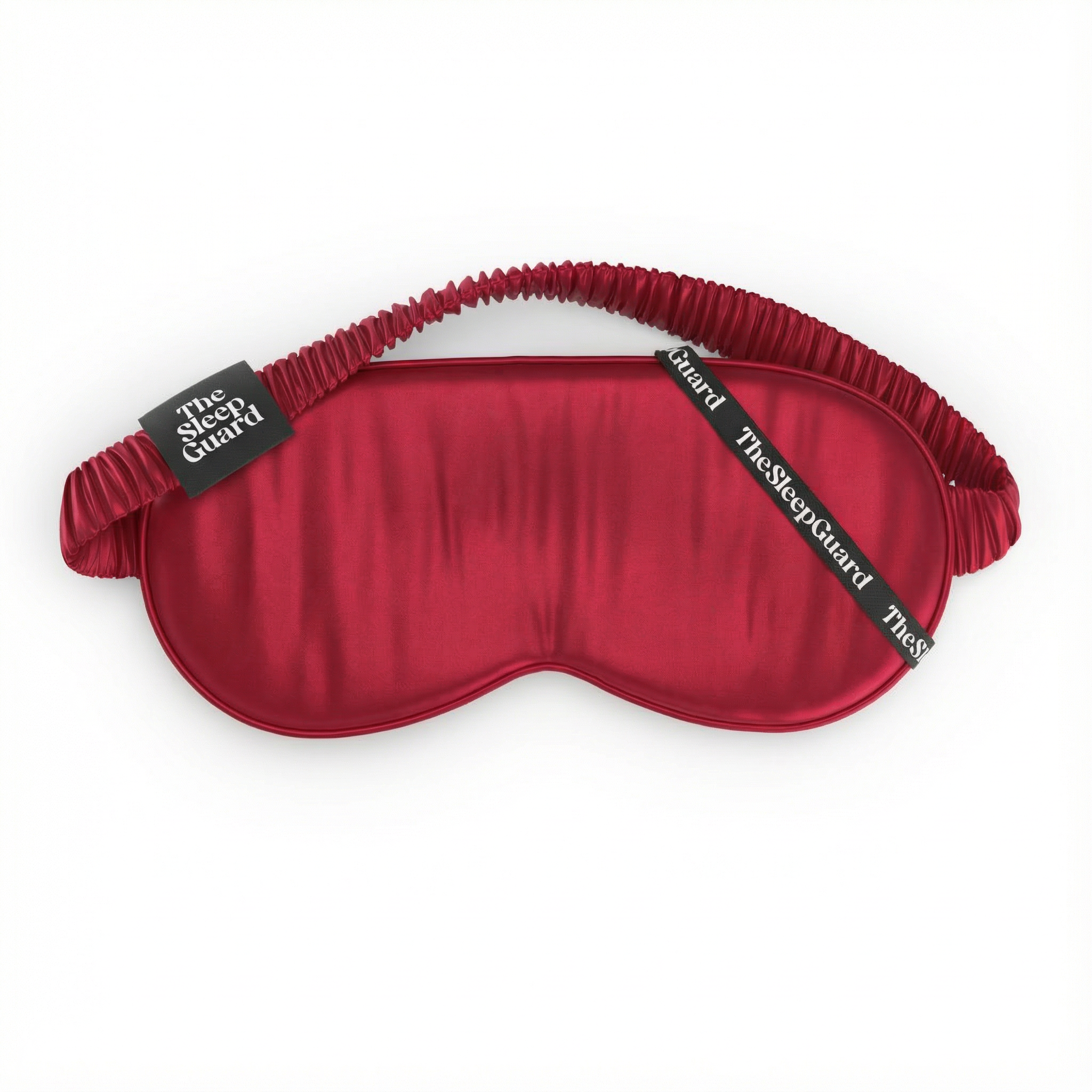 Red sleep mask with 'The Sleep Guard' branding on a white background